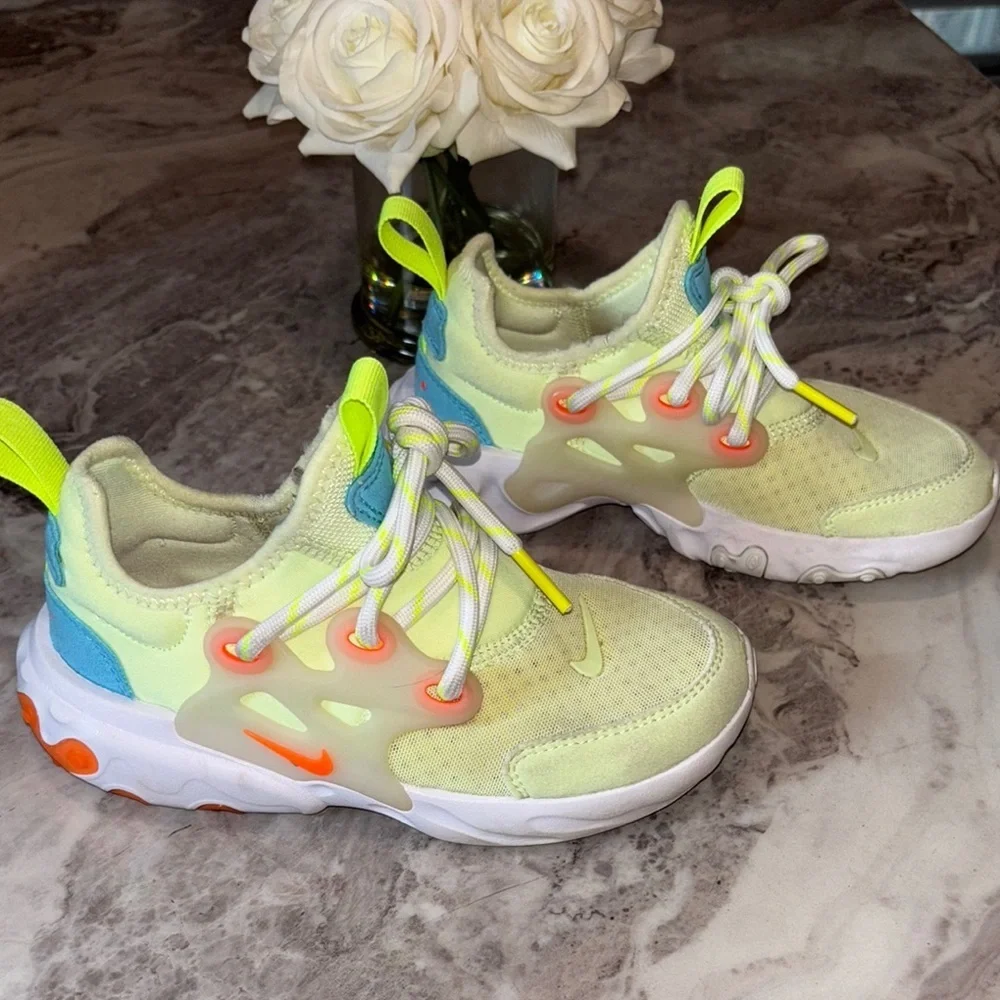Nike Yellow and Blue React Sneakers Dynamic Design